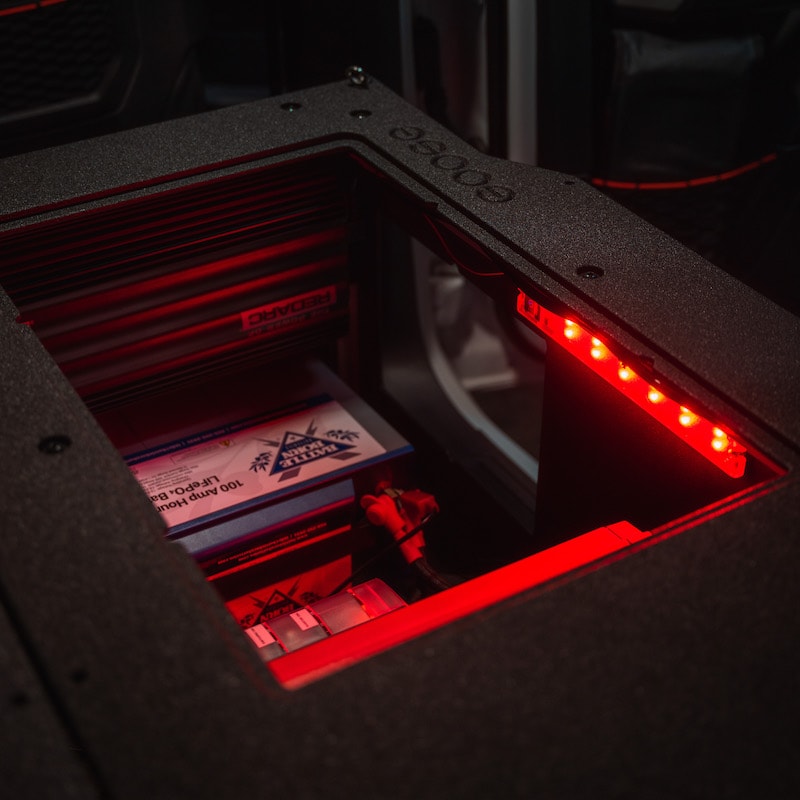 Goose Gear Lithium Battery Box shown with red LED lighting interior of box