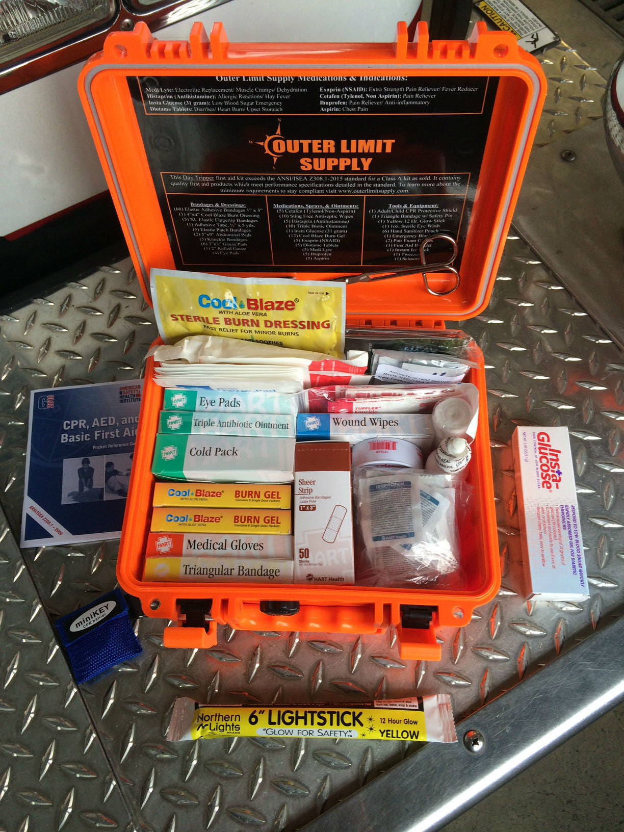 Outer Limit Supply Day Tripper First Aid Kit case laying open to display contents