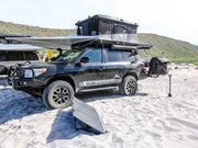 360 degree awning with roof top tent at beach campground