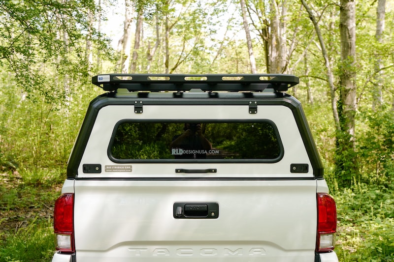 RLD Design platform roof rack for stainless steel truck cap- rear view