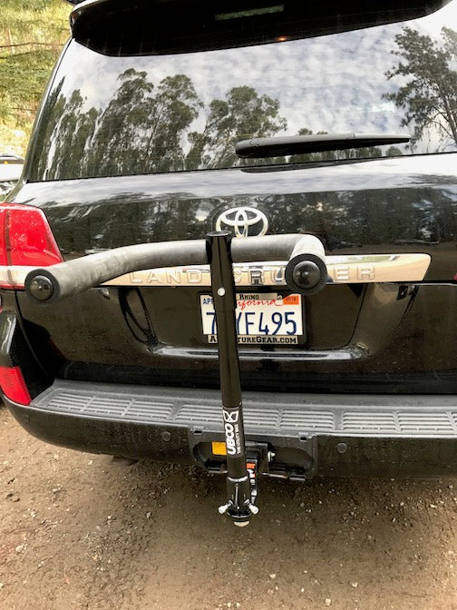 Ubco Towball Mount Bike Rack pictured without bike on back of black Toyota Landcruiser