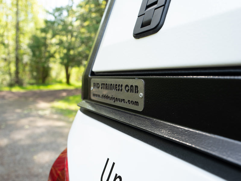 Detail of rear fitment of Toyota Tacoma cap by RLD Design