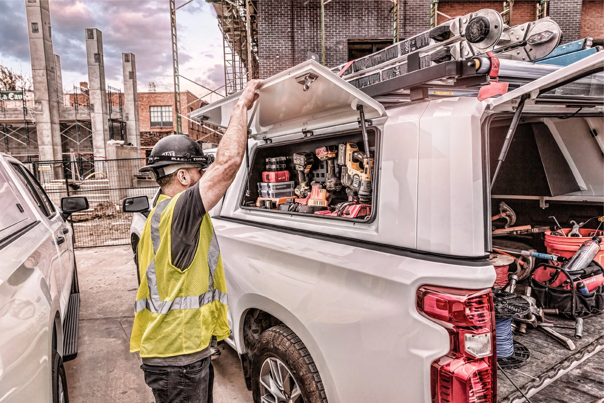Finished trade truck with SmartCap canopy and DECKED drawers, outfitted by Rhino Adventure Gear