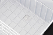 Drain plug located beneath white wire basket of ARB Elements Weatherproof Fridge Freezer