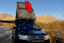Camp King Aluminum Roof Top Tent with red surf board mounted to crossbars