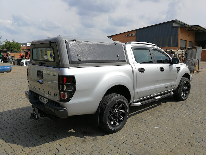 RLD Design stainless Steel Truck Cap for Ford Ranger shown in gray with black doors