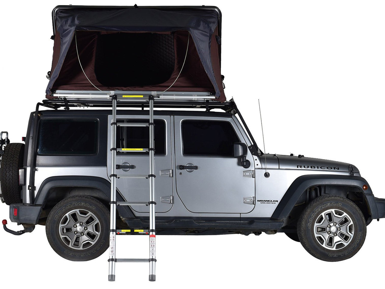 iKamper roof top tent shown open on top of Jeep Rubicon with tent ladder providing entrance to roof top tent over the drivers side rear door of vehicle.