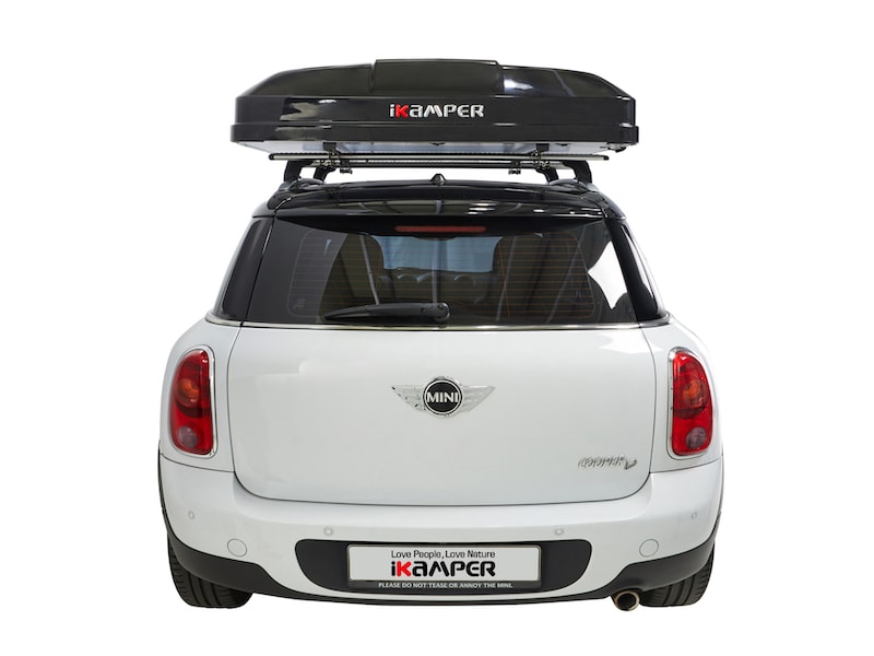 iKamper Skycamp Mini Roof Top Tent shown closes on white Mini Cooper- rear view