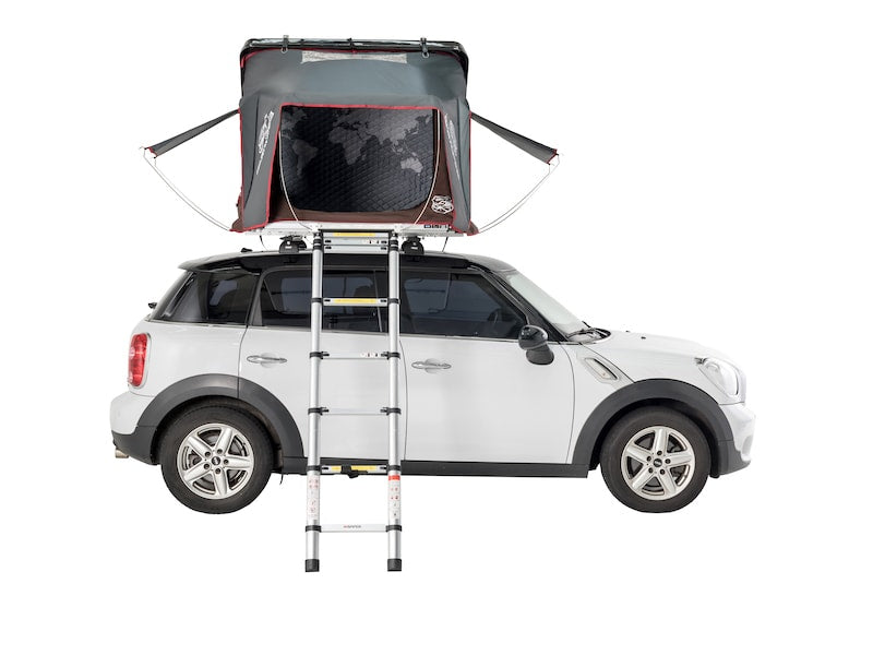 iKamper Skycamp Mini Roof Top Tent shown open on white Mini Cooper with window canopies open