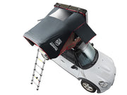 iKamper Skycamp Mini Roof Top Tent shown open on white Mini Cooper- arial view