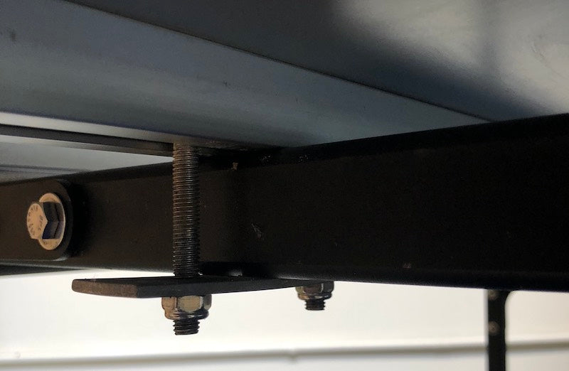 iKamper mounting brackets v. 1.0 for roof top tent installed on crossbars