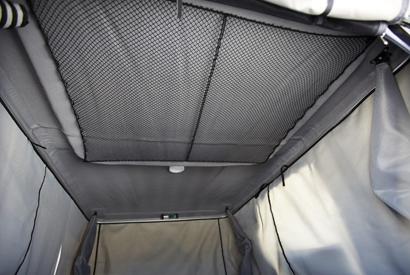 James Baroud Isothermic Kit for insulating roof top tents shown interior view of tent with inner liner attached as a second layer fabric around perimeter of roof top tent