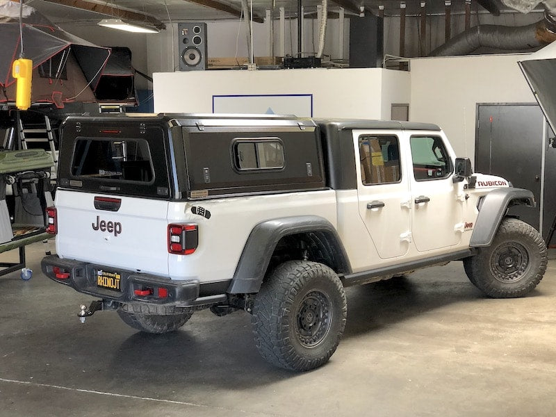 RLD stainless steel canopy with sliding side window upgrade shown on white Jeep Gladiator