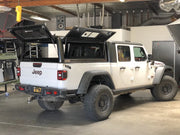 Jeep Gladiator with RLD canopy shown with gull wing doors open