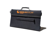 Merlin Solar BXD95 trifold portable solar panel shown folded up into thin black carry pouch