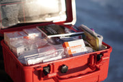 Outer Limit Supply Outback First Aid Kit case laying open to display contents