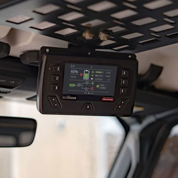 REDARC BMS1230S3R-NA mounted above rearview mirror
