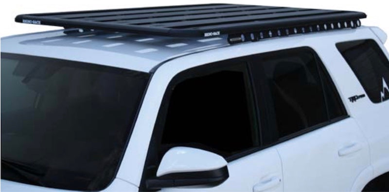 white Toyota 4Runner with Rhino Rack Backbone Mounting System and Pioneer Platform Rack System installed