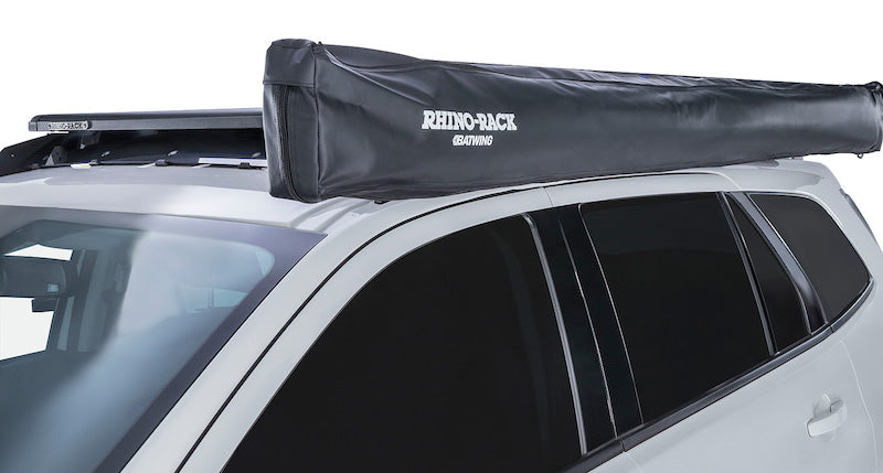 Detail of heavy black cover bag for Batwing Awning mounted on left side of vehicle roof rack
