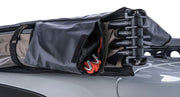 Carry pouch for ropes and stakes integrated into batwing awning cover bag