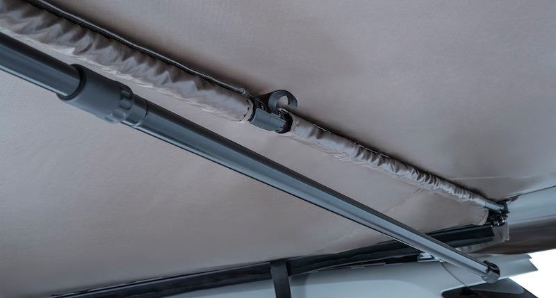 Detail of Batwing Awning integrated leg unfolding from underside of 270 awning