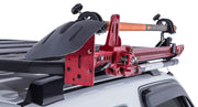 high lift jack and recovery shovel attached to roof rack with combination bracket kit