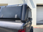 RLD Design Stainless Steel Canopy on gray RAM 2500 HD shown with black doors