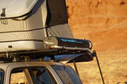 Road Shower 4 portable shower on roof rack next to james baroud space roof top tent