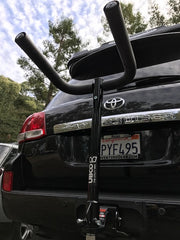 View from below looking up at Ubco Towball Bike Rack coupled to Toyota Landcruiser without Ubco 2x2 electric utility bike on rack