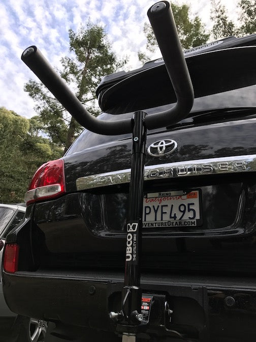 View from below looking up at Ubco Towball Bike Rack coupled to Toyota Landcruiser without Ubco 2x2 electric utility bike on rack