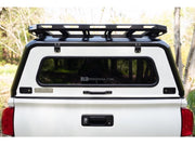 Rear window of RLD Stainless steel truck cap on Toyota Tacoma