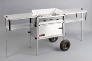 Trail Kitchen Camp Kitchen with Integrated Stove shown fully assembled with wheels for easily fine tuning your kitchen location