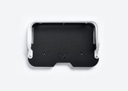 Overhead view of front cargo deck for Ubco 2x2 has dual white aluminum rails that match Ubco 2x2 bike and a solid black durable HDPE deck with subtle embossed Ubco logo