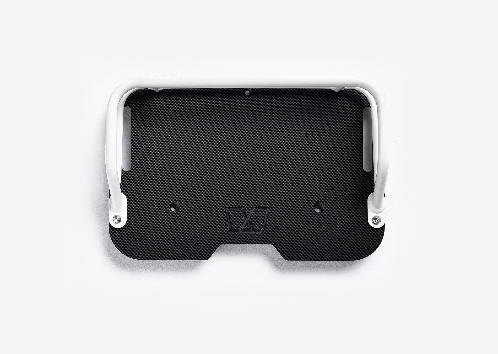 Overhead view of front cargo deck for Ubco 2x2 has dual white aluminum rails that match Ubco 2x2 bike and a solid black durable HDPE deck with subtle embossed Ubco logo
