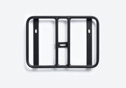 Ubco 2x2 pannier rack are black aluminum alloy and mount in three places to the ubco 2x2 electric bike