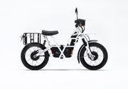 Side profile view of Ubco 2x2 electric adventure bike with pannier racks mounted on rear of bike