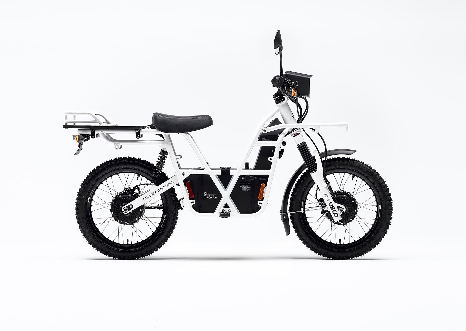 Side profile view of 2018 Ubco 2x2 electric adventure bike with accessory rear cargo deck installed